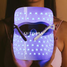 LED Маска за лице - Lumina Glow с включени сини светлини и лого Cutisora.